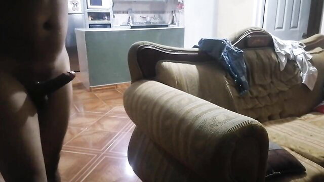 Naked Latino guy stroking thick cock near couch in amateur neighbor hookup