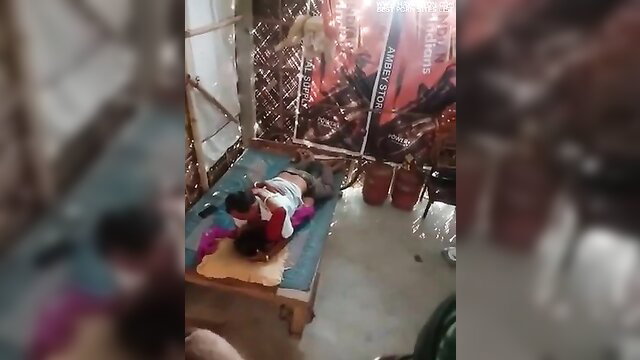 Amateur Indian woman lying nude on bed in explicit pose