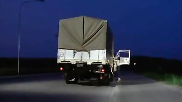 Classic French truck stop night scene with open door tease