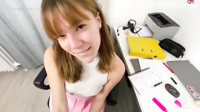 Anne Eden in pink skirt at desk, spontaneous study fuck tease