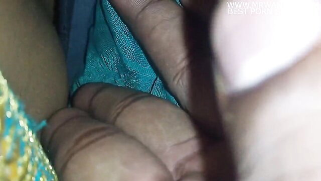 Tamil lovers romance: man fondling woman's big tits in sexy green lace lingerie