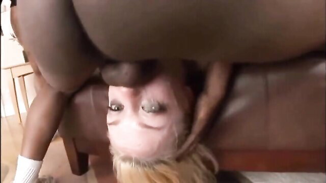 Annette Schwarz gagging on huge black cock in upside-down deepthroat
