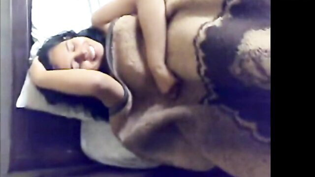 Smiling Indian girl cuddling huge cock in bed homemade MMS