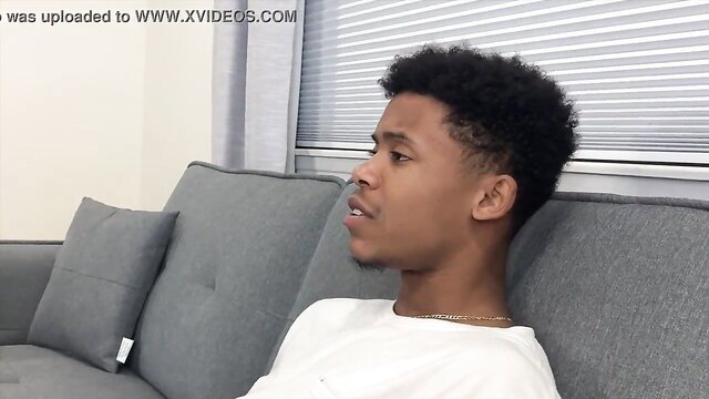 Young black guy Lil D on couch in Isabelle Miller stepmom booboo scene