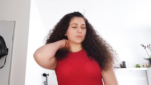 Curvy brunette Isi B. in red dress, neck tease, Ersties amateur