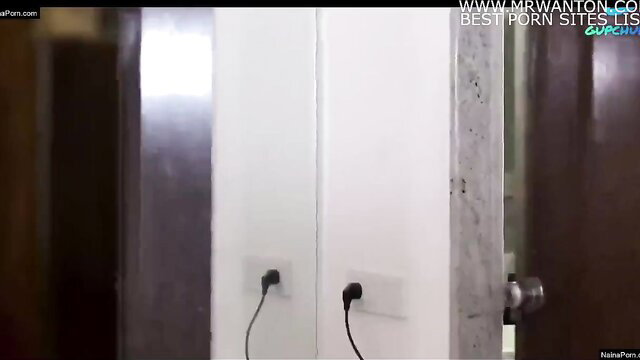 Indian amateur babe in white room with mirror, power outlet closeup