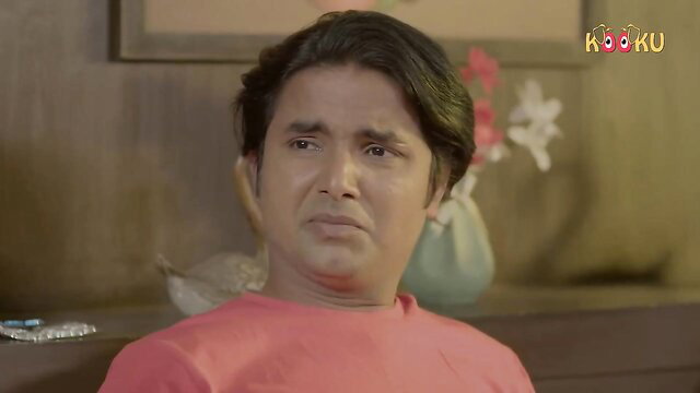 Suno Sasur Ji Kooku - Indian man in red shirt smirks seductively