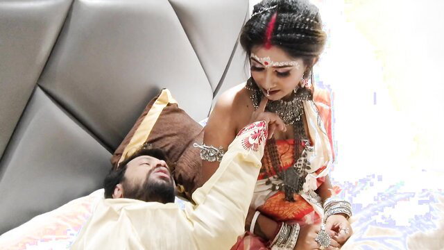 Desi bride in red sari sucks groom's finger on wedding first night
