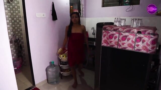 Busty Indian maid in red towel after shower in kitchen