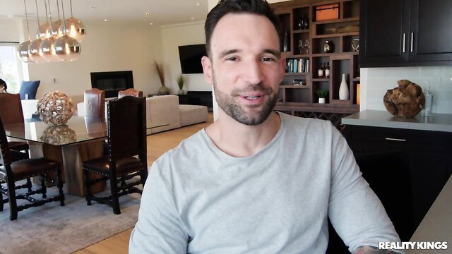 Alex Legend smiling in Reality Kings kitchen video thumbnail