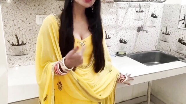 Hot Indian wife in yellow salwar kameez flipping off seductively