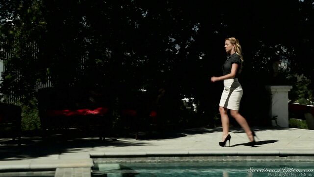 Blonde Cherie DeVille walks sexy in skirt heels by pool