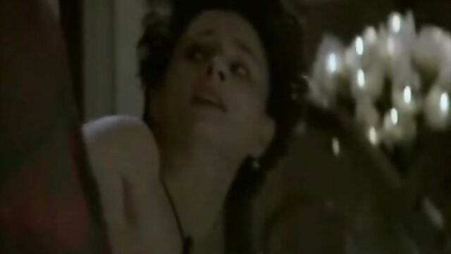 Steamy MILF with curly black hair in intense ecstasy closeup