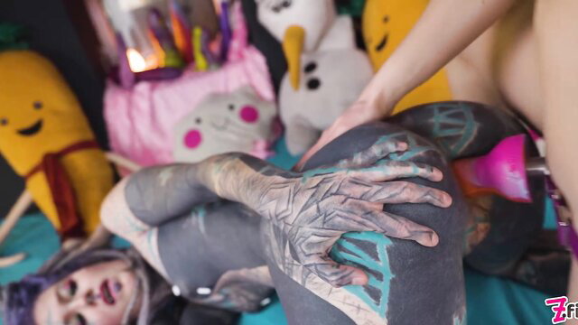 Anuskatzz tattooed legs spread by Miss Flora with pink toy penetration