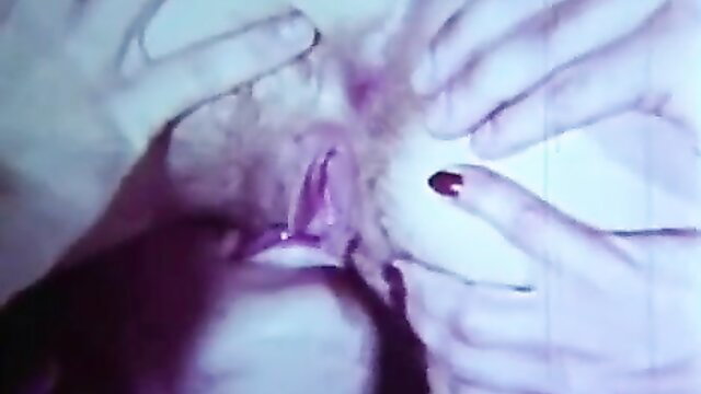 Vintage closeup of hairy pussy spread by hands in cowgirl tease