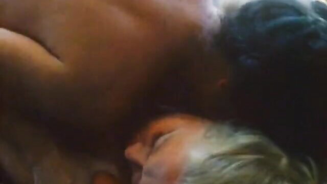 Vintage gay porn thumbnail of black man embracing older white daddy in bed