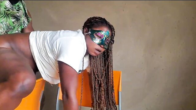 Masked black woman in doggy on chair takes throbbing BBC, pussy quivering