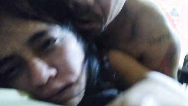 Duda Hugnen closeup with man hugging her in bed, hot threesome tease