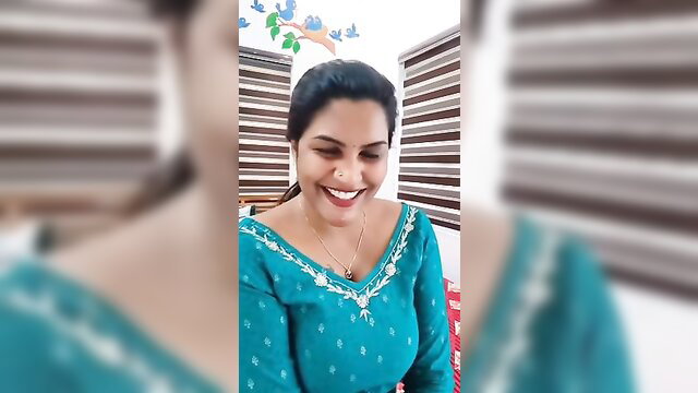 Mallu makeup artist Reshma Rechu smiling in teal embroidered top