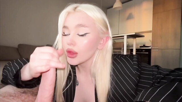 Blonde Russian hoe stroking thick cock in suit, juicy gyatt