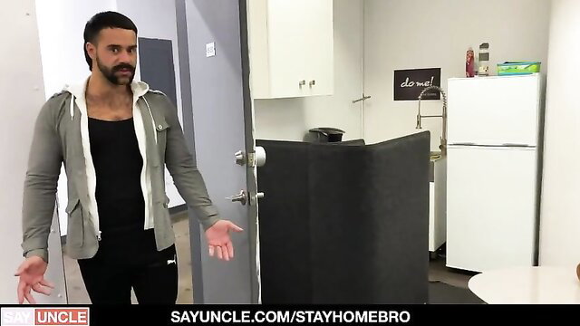 Quarantined Latino hunk in hoodie shrugs in office, Say Uncle gay scene