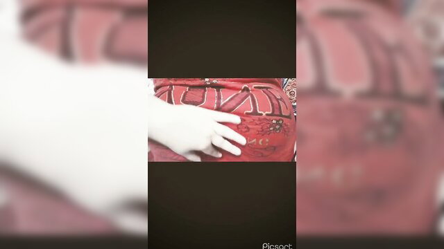 Estephania The Nyx hand on red embroidered top, sensual tease