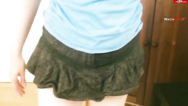 DeineFickmaus in tight teal top and short pleated skirt, teasing upskirt
