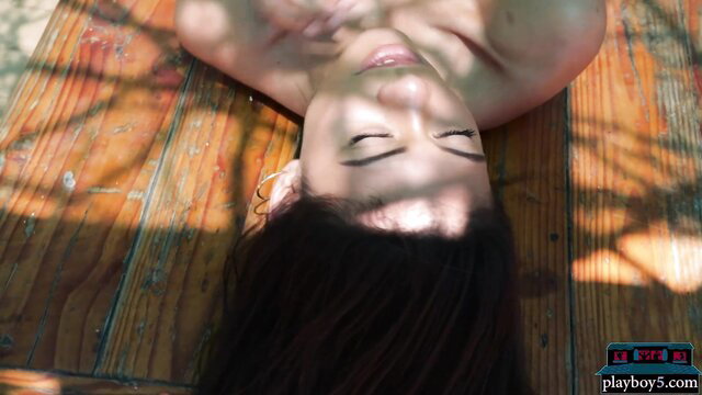 Hannah Le petite Asian teen topless upside down on ranch deck for Playboy