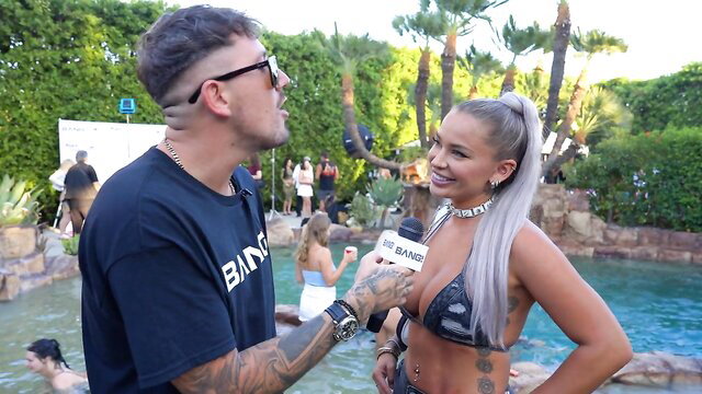 Luna Star in bikini interviewed by Ryan Pownall at Summer XXX Games pool party