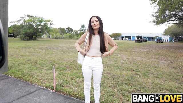 Izi Blu Sky in white jeans & top at outdoor Hussie Pass shoot