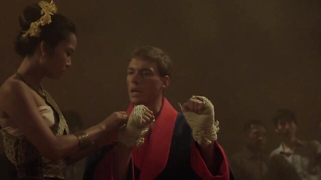 Asian beauty wraps fighter's hands in sultry pre-fight ritual, 1989 Kickboxer scene