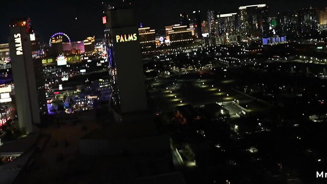 Vegas night skyline at Palms Casino with lit neon signs