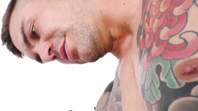 Tattooed muscular man closeup in We Fuck Black Girls Demi Sutra Spanish lesson
