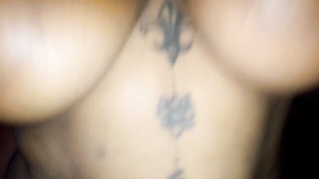 Jhodez big tits ebony teen fleur-de-lis tattoo chest closeup