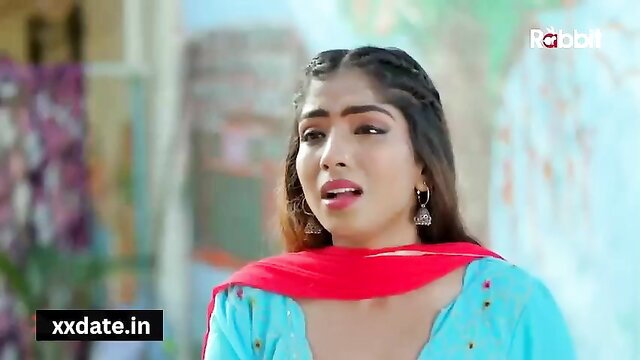 Indian busty bahu in blue salwar kameez, seductive expression