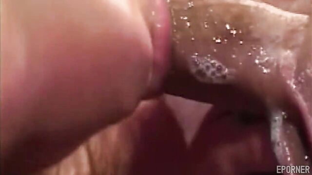 Vintage closeup of thick white cock cumming on wet shaved pussy lips