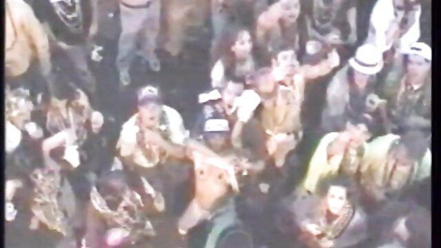Crowd of wild amateur girls going crazy in chaotic group party scene