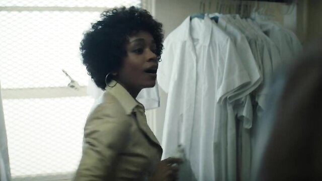 Gail O'Grady hot curly afro in beige suit Duster s01e03-04
