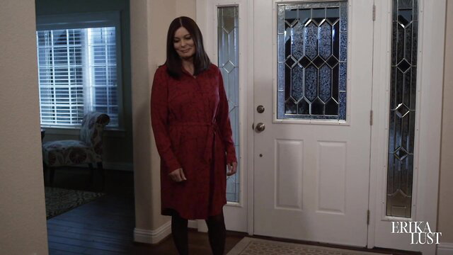 MILF widow in sexy red dress and stockings at door - Erika Lust