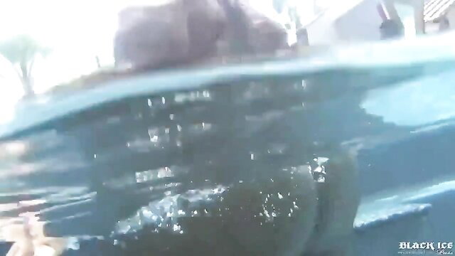 Black busty BBW with huge tits and ass in pool, wet curves