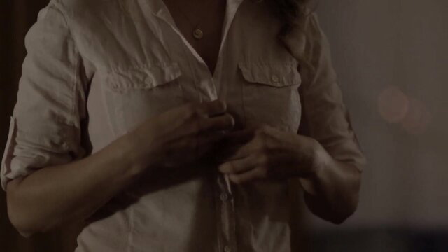 Jennifer Mudge as Debra Whitehead unbuttoning blouse in Boss 2011