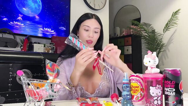 MeiLee ASMR beautiful Asian babe sucks lollipop in lingerie