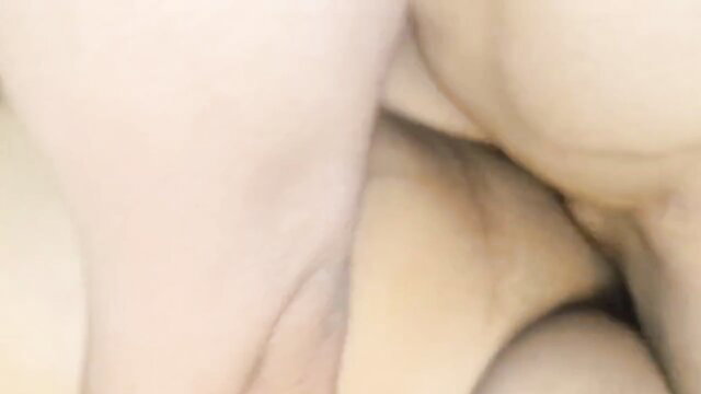 Blurry closeup of Srimoyee's pale shaved pussy spread wide in naughty sex vlog