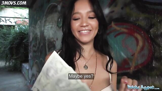 Asia Vargas smiling seductively holding paper, teasing maybe yes