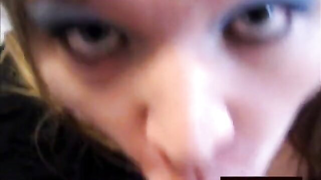 Closeup of mystery blonde's intense eyes and face in amateur blowjob thumbnail
