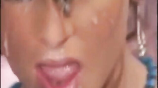 Closeup of woman's open mouth with tongue out, ready for hot cumshot