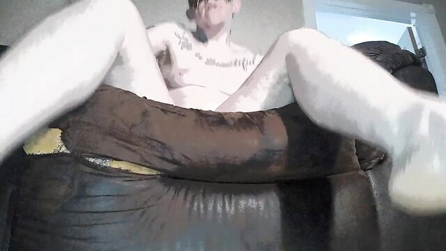 HD trans stud hairy body exposed, legs spread on couch worship