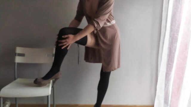 Polish MILF teases with nylons and tights, dirty talk in dress