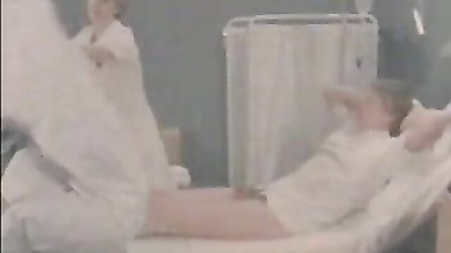 Vintage hospital orgy: nurse lifts gown exposing pussy over patient girl