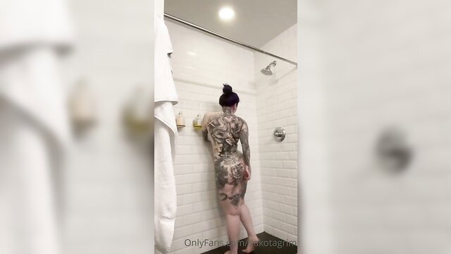 Raven Grmm tattooed beauty in steamy shower, nude back view